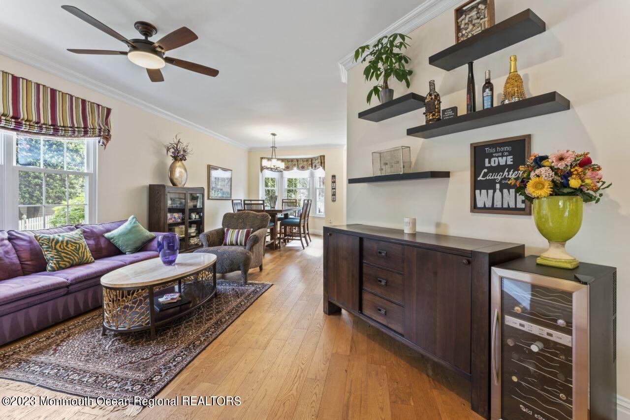 18 Nicholson Key Colts Neck, NJ 07722 - Photo 5 of 46 a living room with granite countertop furniture and a chandelier