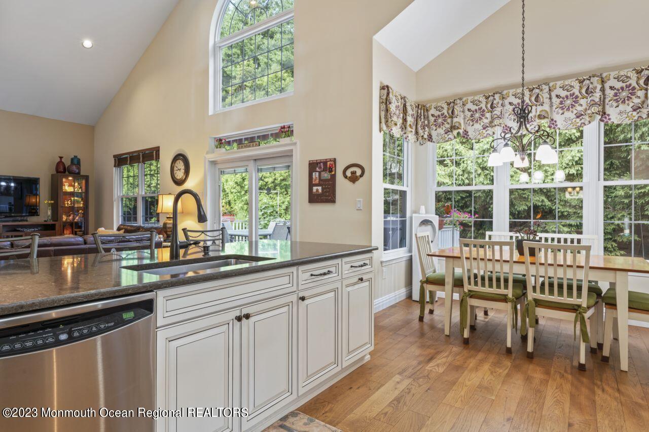 18 Nicholson Key Colts Neck, NJ 07722 - Photo 8 of 46 a kitchen with counter top space and wooden floor