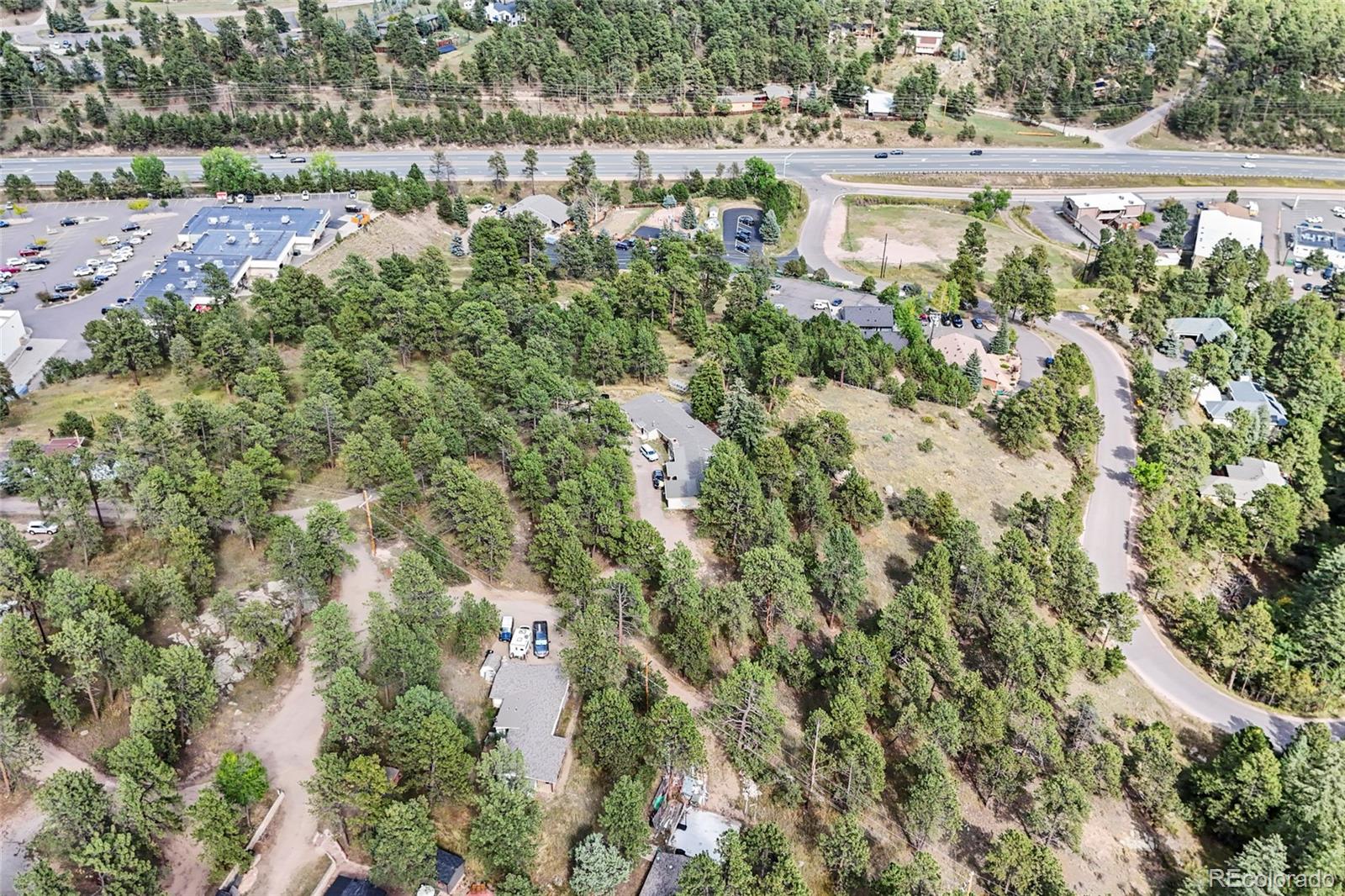 3942 Palo Verde Road Evergreen, CO 80439 - Photo 18 of 41 an aerial view of residential house with outdoor space and trees all around