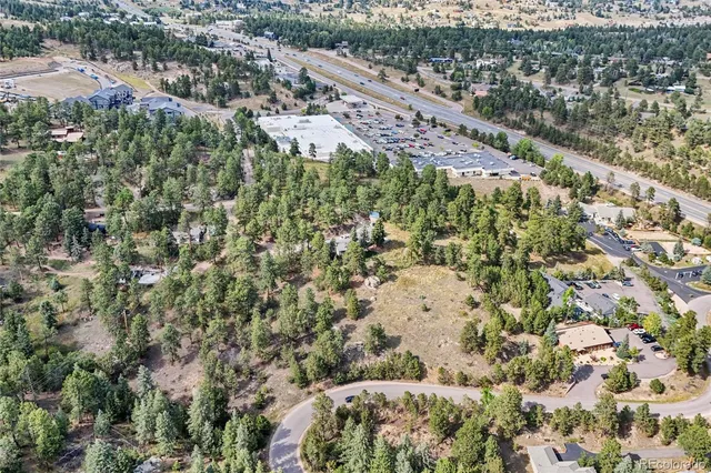 an aerial view of residential house with outdoor space