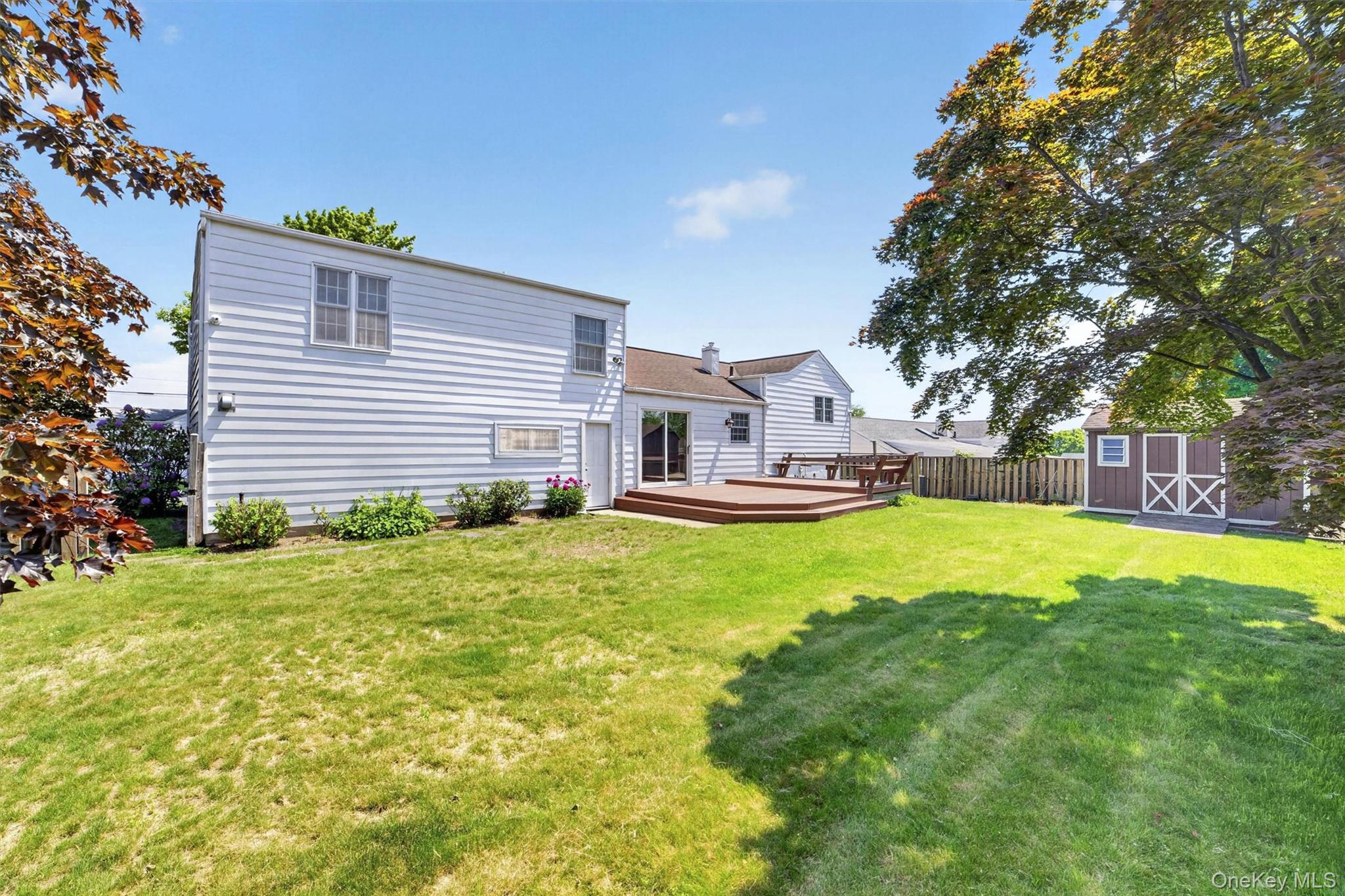 263 Croydon Road Yonkers, NY 10710 - Photo 41 of 43 a view of a house with a backyard