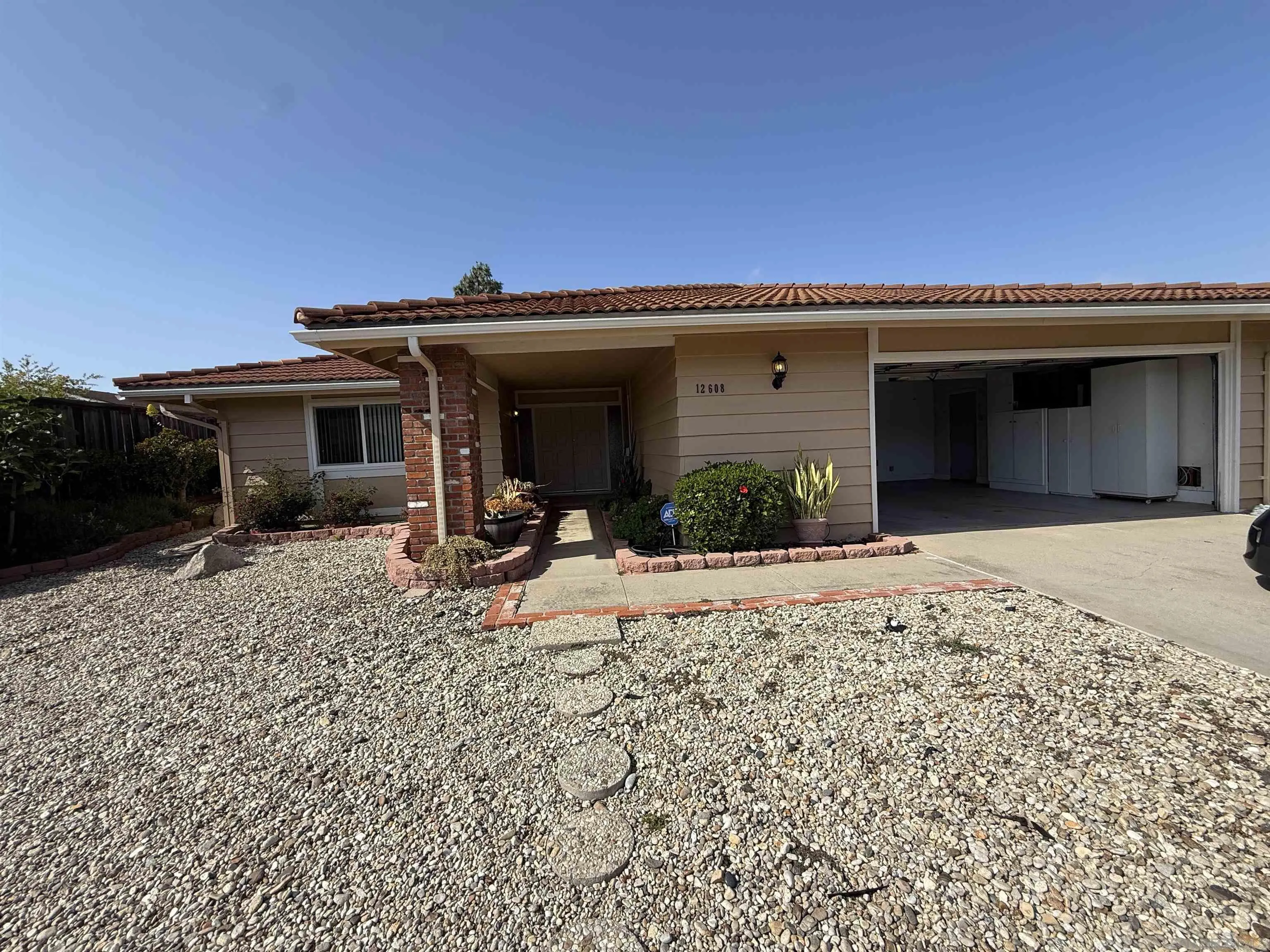 12608 Mantilla Road San Diego, CA 92128 - Photo 35 of 37 a view of a house with patio