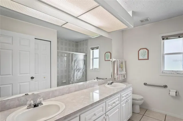 a view of a house with porch and wooden floor