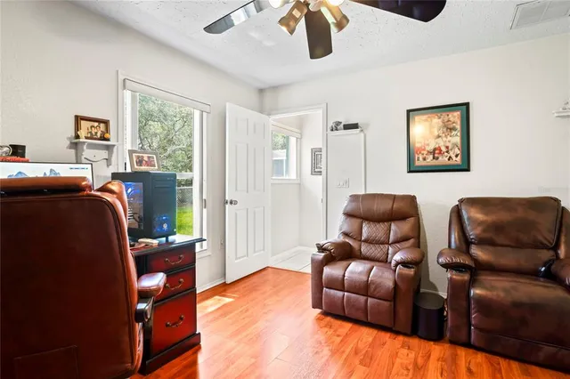 an aerial view of residential house with outdoor space and swimming pool