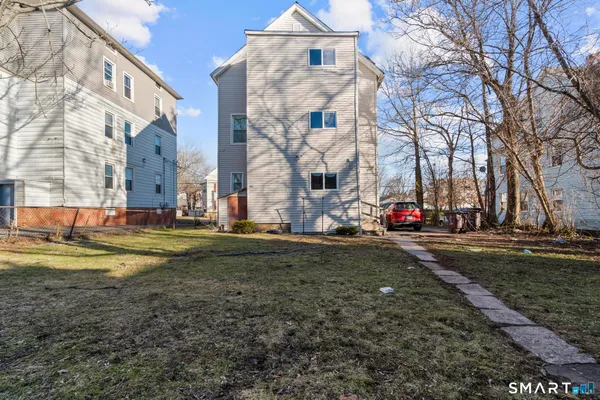 a view of road with large building