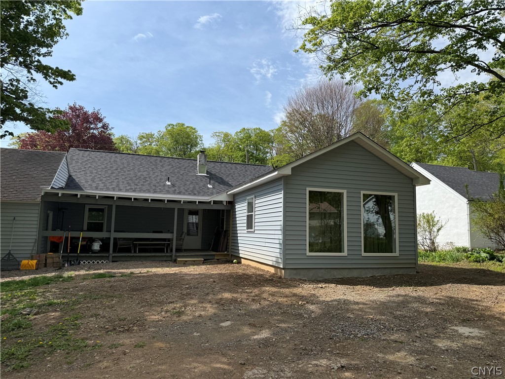 52 Beechwood Road New Hartford, NY 13413 - Photo 5 of 22 Rear view of home with covered porch