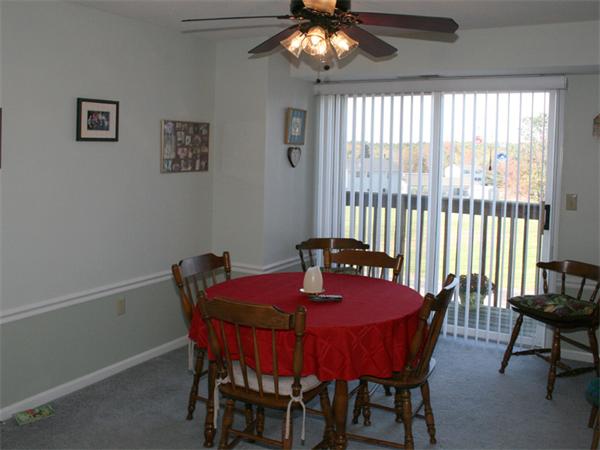 96 Century Way, Unit 96 Gardner, MA 01440 - Photo 3 of 10 a view of a dining room with furniture window and outside view
