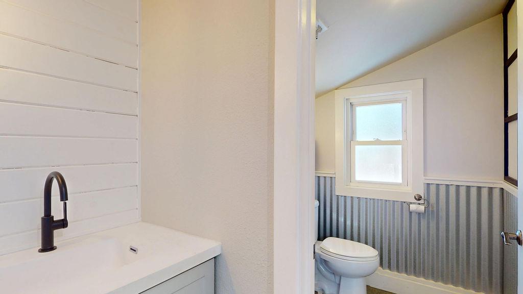 133 Brunswick Road Grass Valley, CA 95945 - Photo 15 of 47 a bathroom with a sink and a toilet