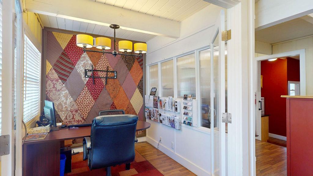 133 Brunswick Road Grass Valley, CA 95945 - Photo 6 of 47 a view of a balcony with furniture and chandelier