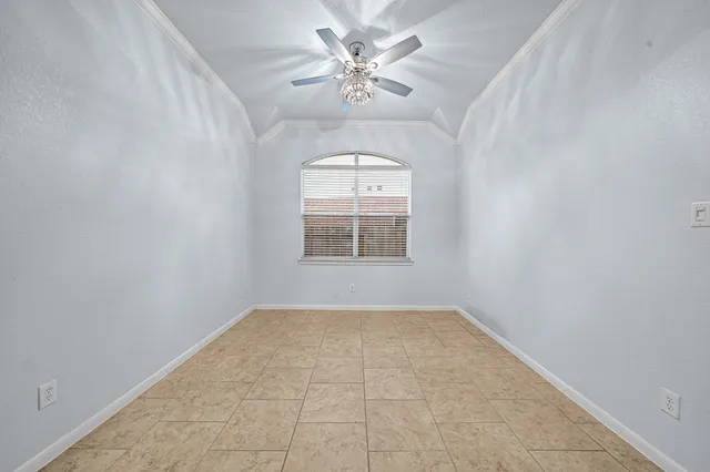 a large kitchen with stainless steel appliances granite countertop a stove and a refrigerator