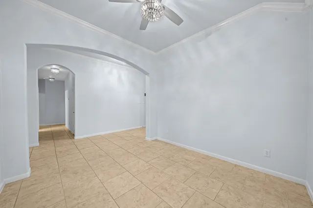 a view of an empty room with a fireplace