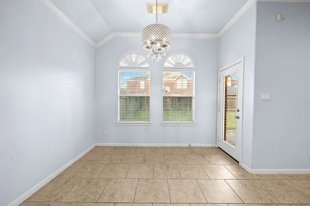 a view of walk in closet with wooden floor