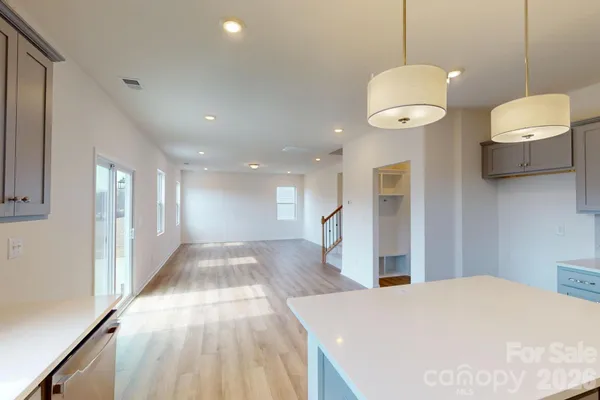a view of a kitchen with a sink and dishwasher