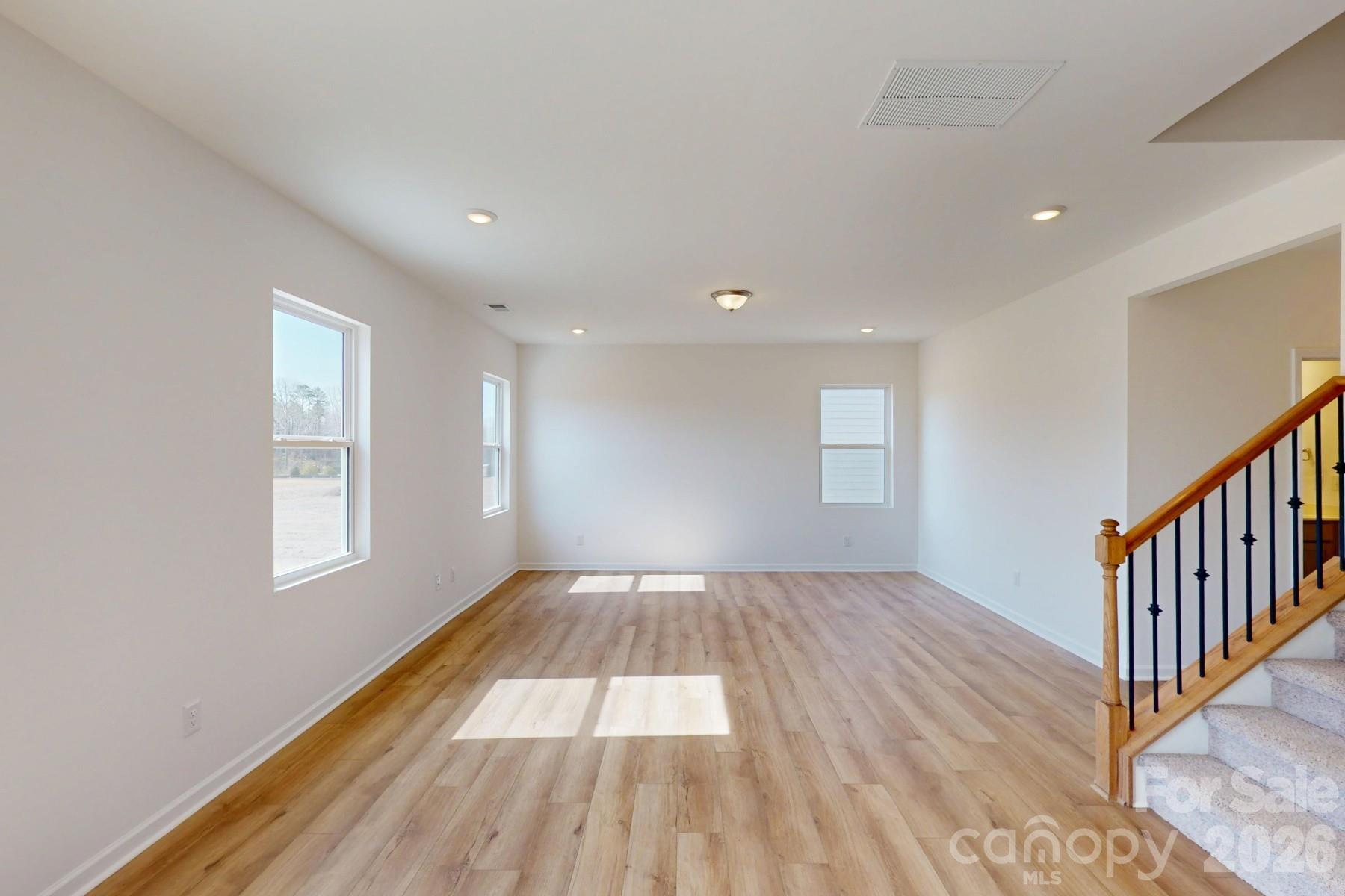 920 Barker Street Monroe, NC 28112 - Photo 13 of 36 a view of an empty room and window