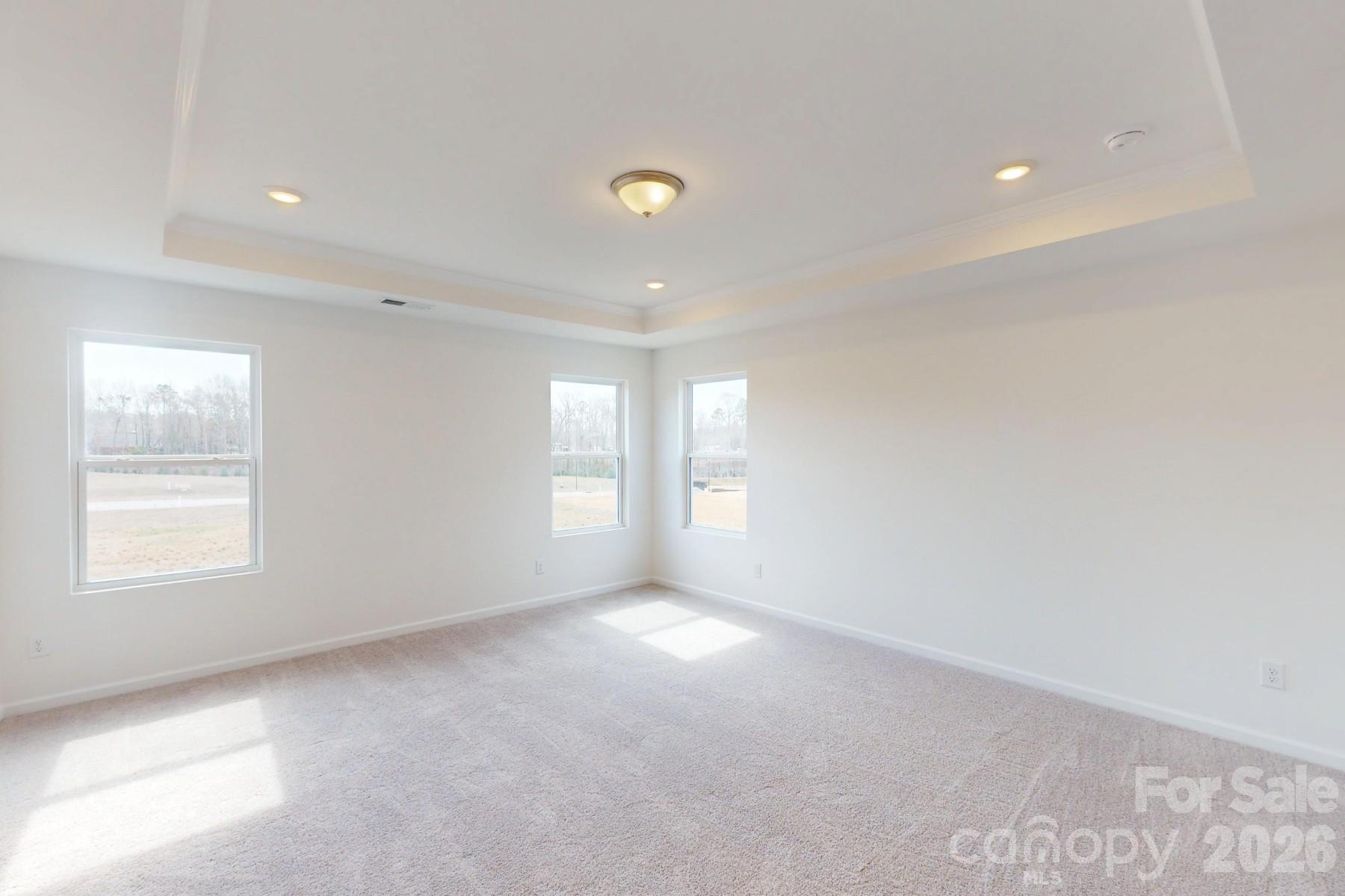 920 Barker Street Monroe, NC 28112 - Photo 25 of 36 an empty room with windows and closet
