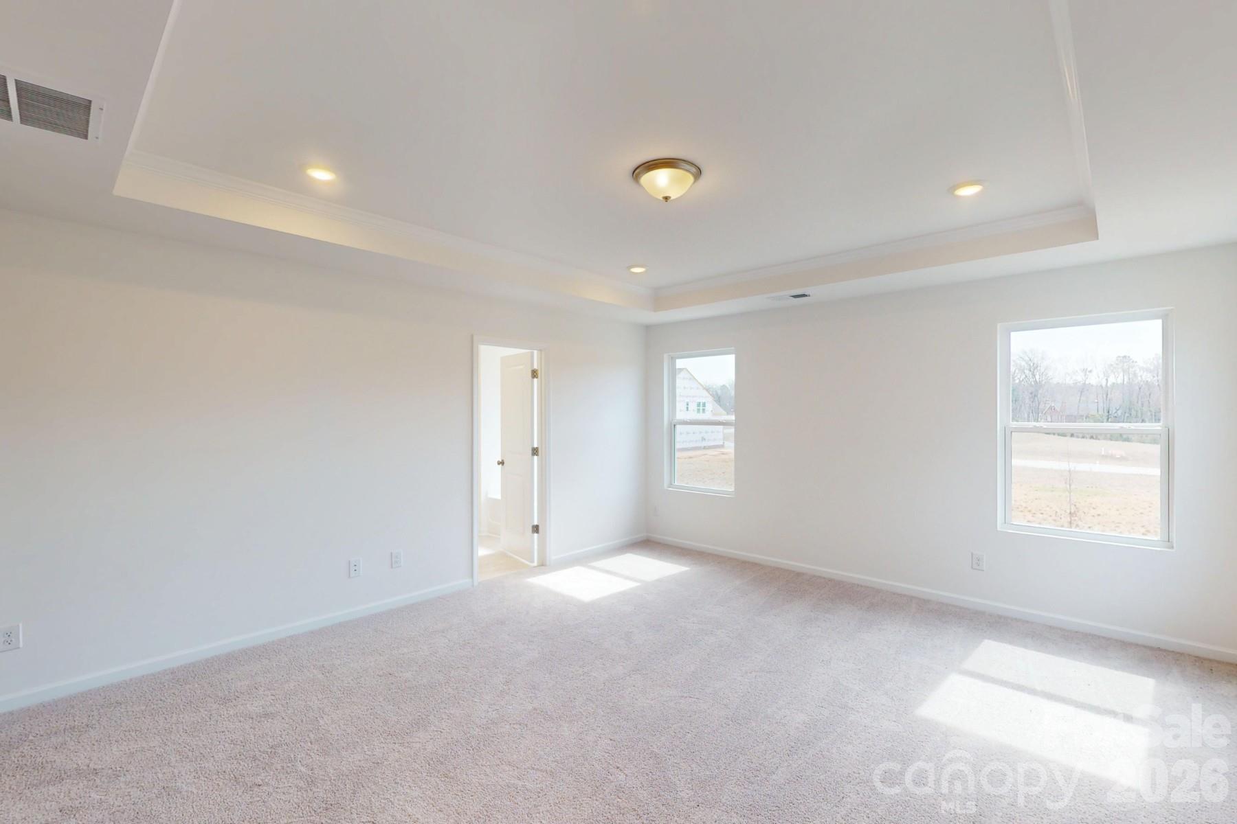 920 Barker Street Monroe, NC 28112 - Photo 26 of 36 an empty room with windows