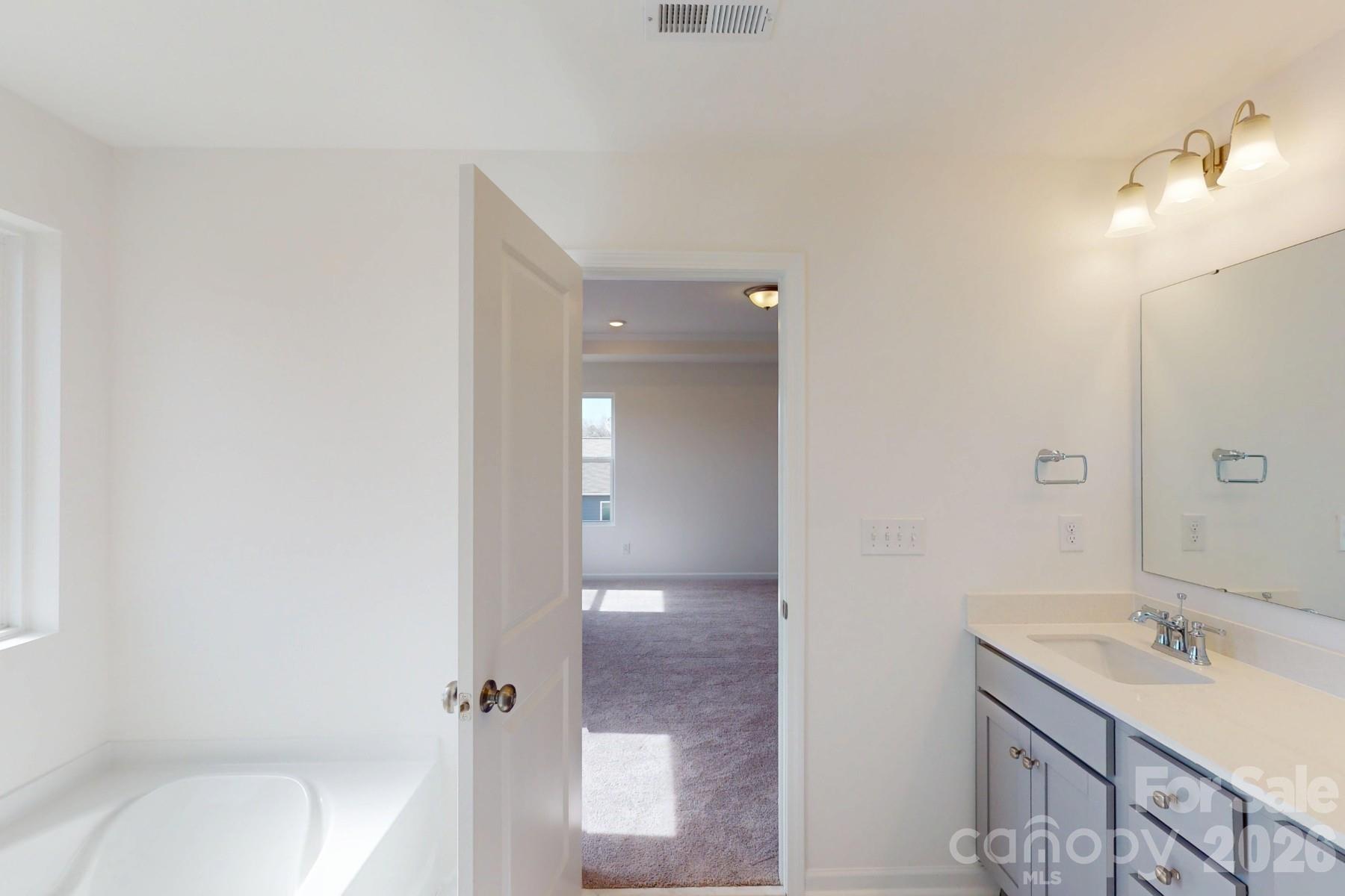 920 Barker Street Monroe, NC 28112 - Photo 28 of 36 a bathroom with a sink toilet and shower