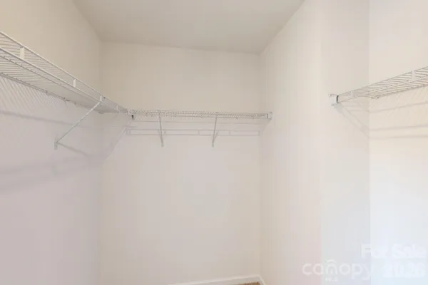 a view of a room with racks on the wall