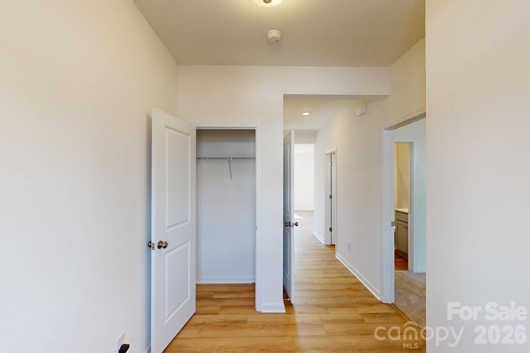 920 Barker Street Monroe, NC 28112 - Photo 3 of 36 a view of a hallway with wooden floor