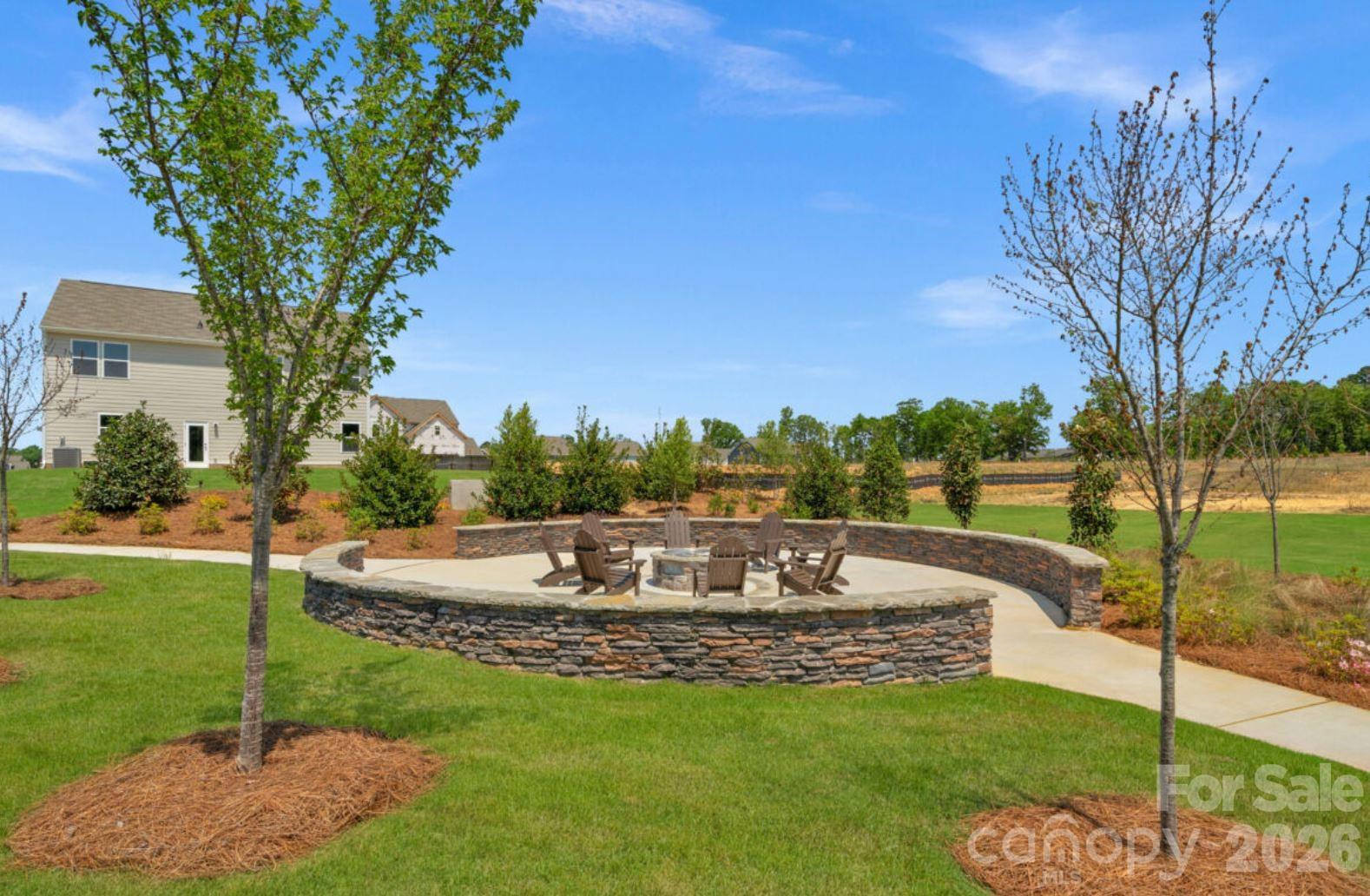 920 Barker Street Monroe, NC 28112 - Photo 32 of 36 a view of outdoor space with garden and trees