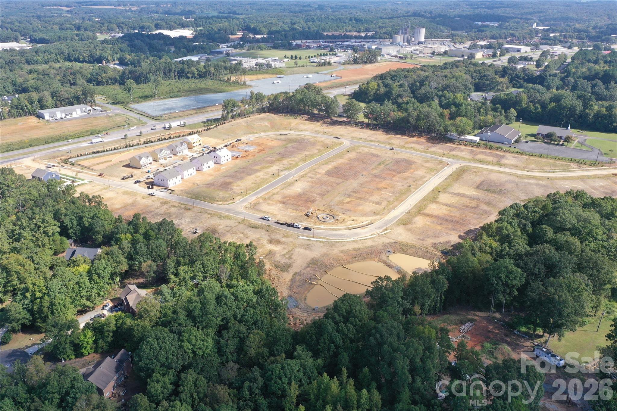 920 Barker Street Monroe, NC 28112 - Photo 35 of 36 an aerial view of lake residential house and outdoor space