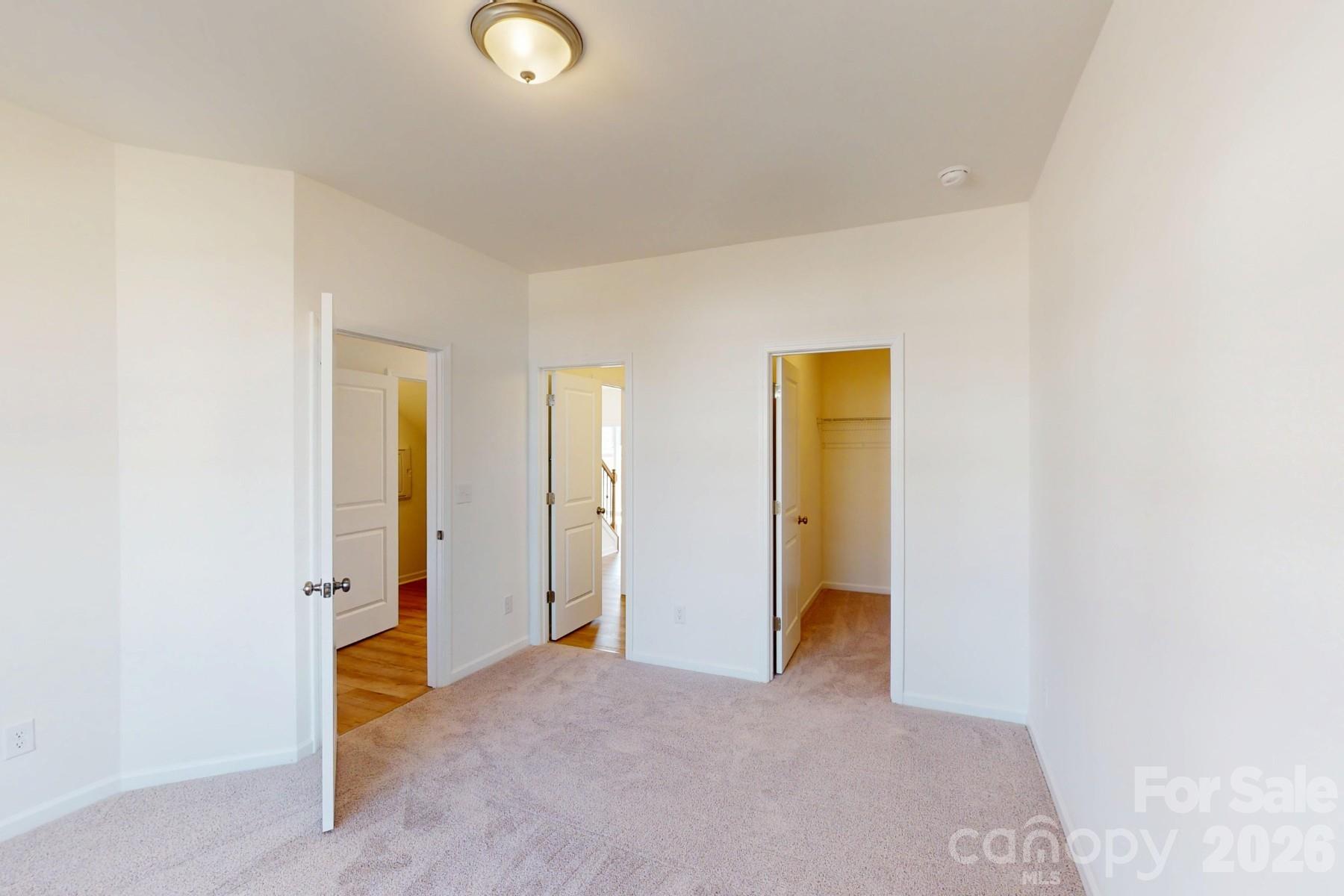 920 Barker Street Monroe, NC 28112 - Photo 6 of 36 a view of an empty room with closet and a window