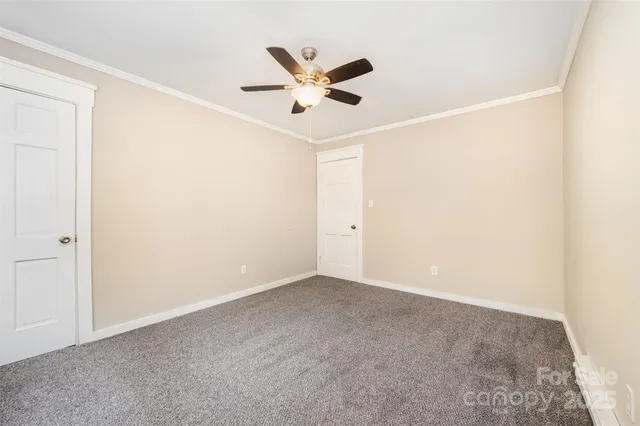 an a ceiling fan and a window