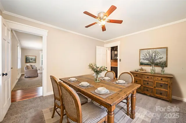 a view of a dining room and livingroom with furniture