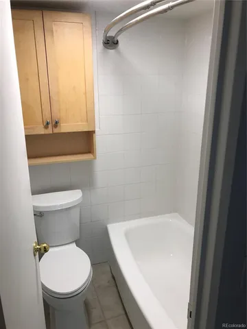 a bathroom with a sink a mirror and a shower