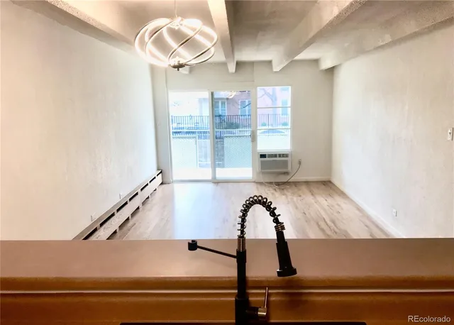 a picture of a room with windows