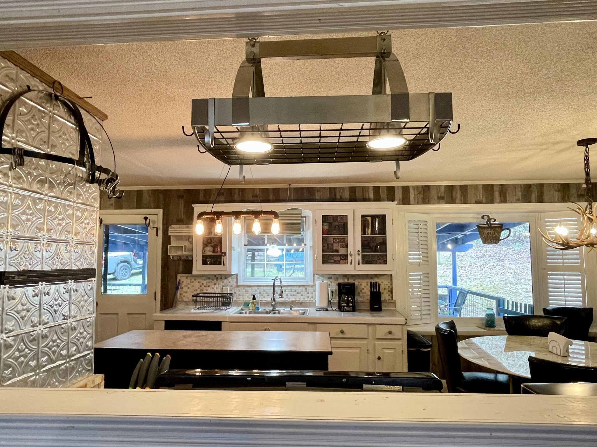 1522 Turkey Creek Road Tellico Plains, TN 37385 - Photo 27 of 34 a view of living room with kitchen island stainless steel appliances and living room view