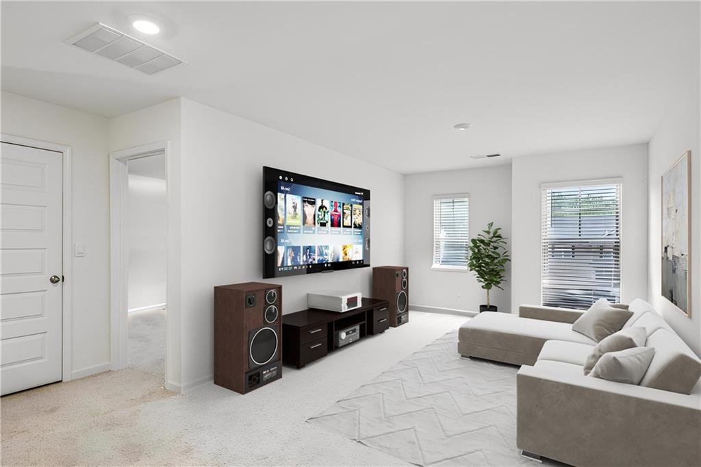 5320 Flat Rock Point Lithonia, GA 30038 - Photo 14 of 35 a living room with furniture and a flat screen tv