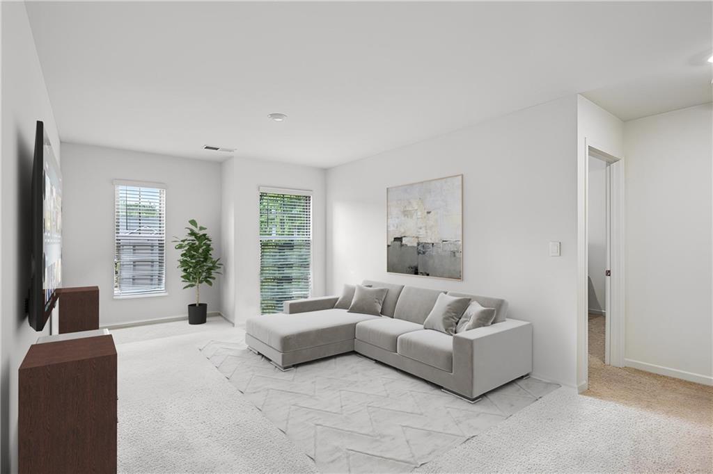 5320 Flat Rock Point Lithonia, GA 30038 - Photo 15 of 35 a living room with furniture and a large window