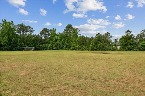 a view of an ocean and yard