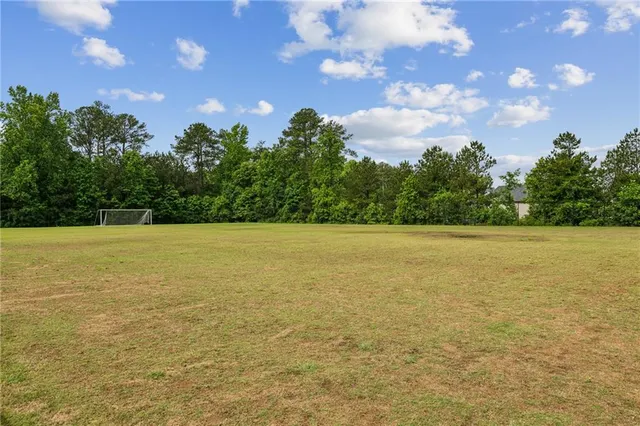a view of an ocean and yard