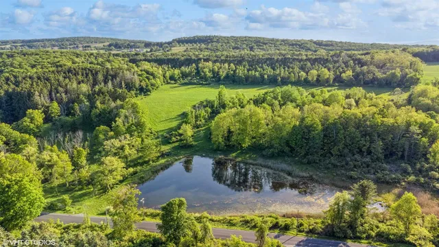 a view of lake with mountain in background