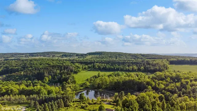 a view of lake with green space