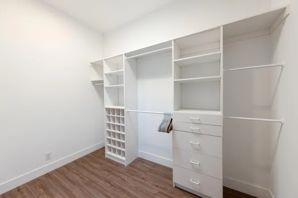 a view of an empty walk in closet