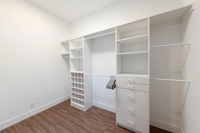 a view of an empty walk in closet