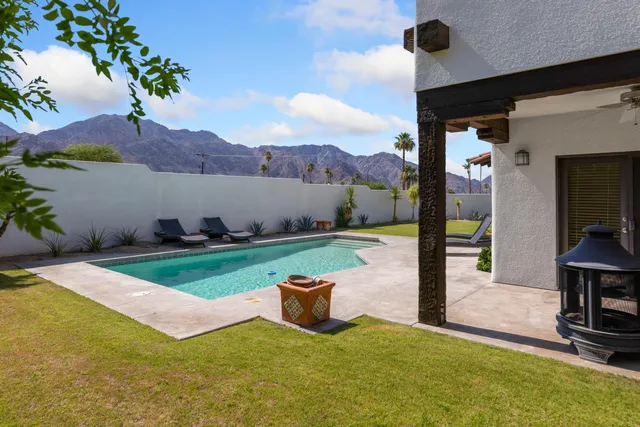 a view of a garden with a slide