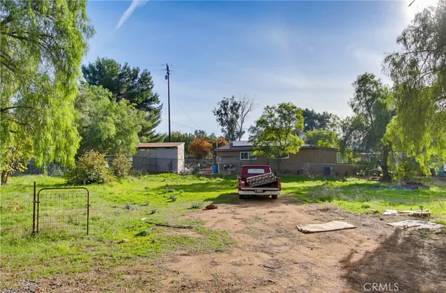 a house view with a garden space