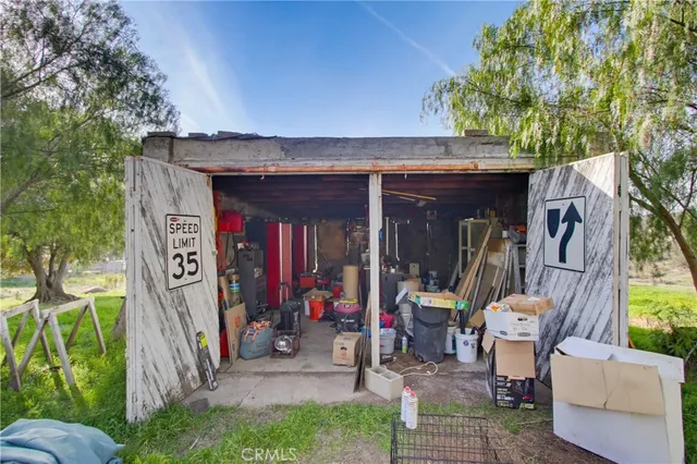 a view of an chairs and table in a patio