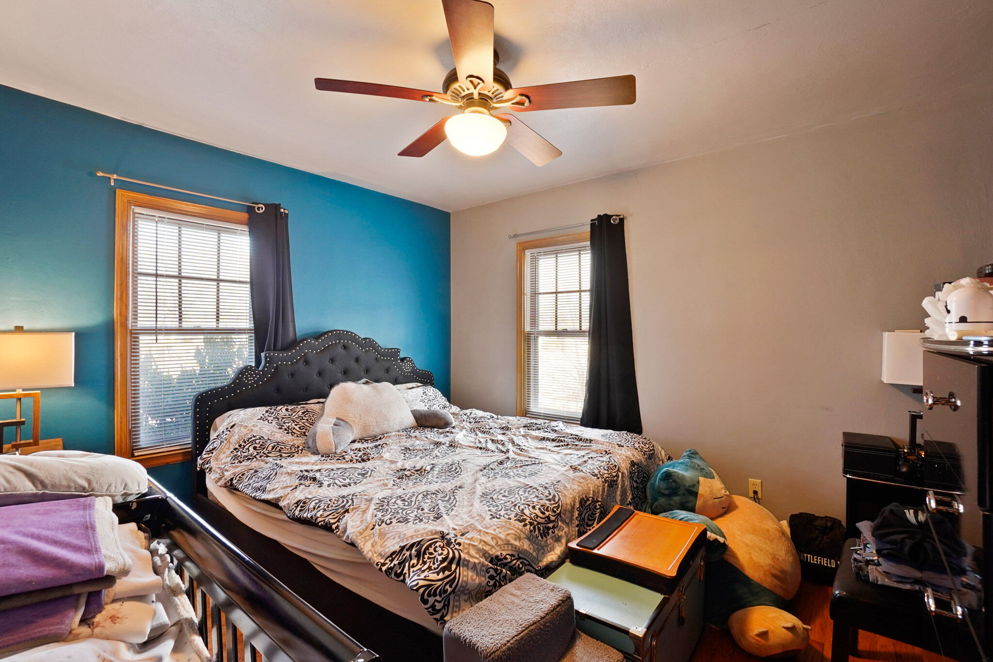 244 Dwiggins Griffith, IN 46319 - Photo 11 of 15 a bedroom with a bed and dresser with mirror