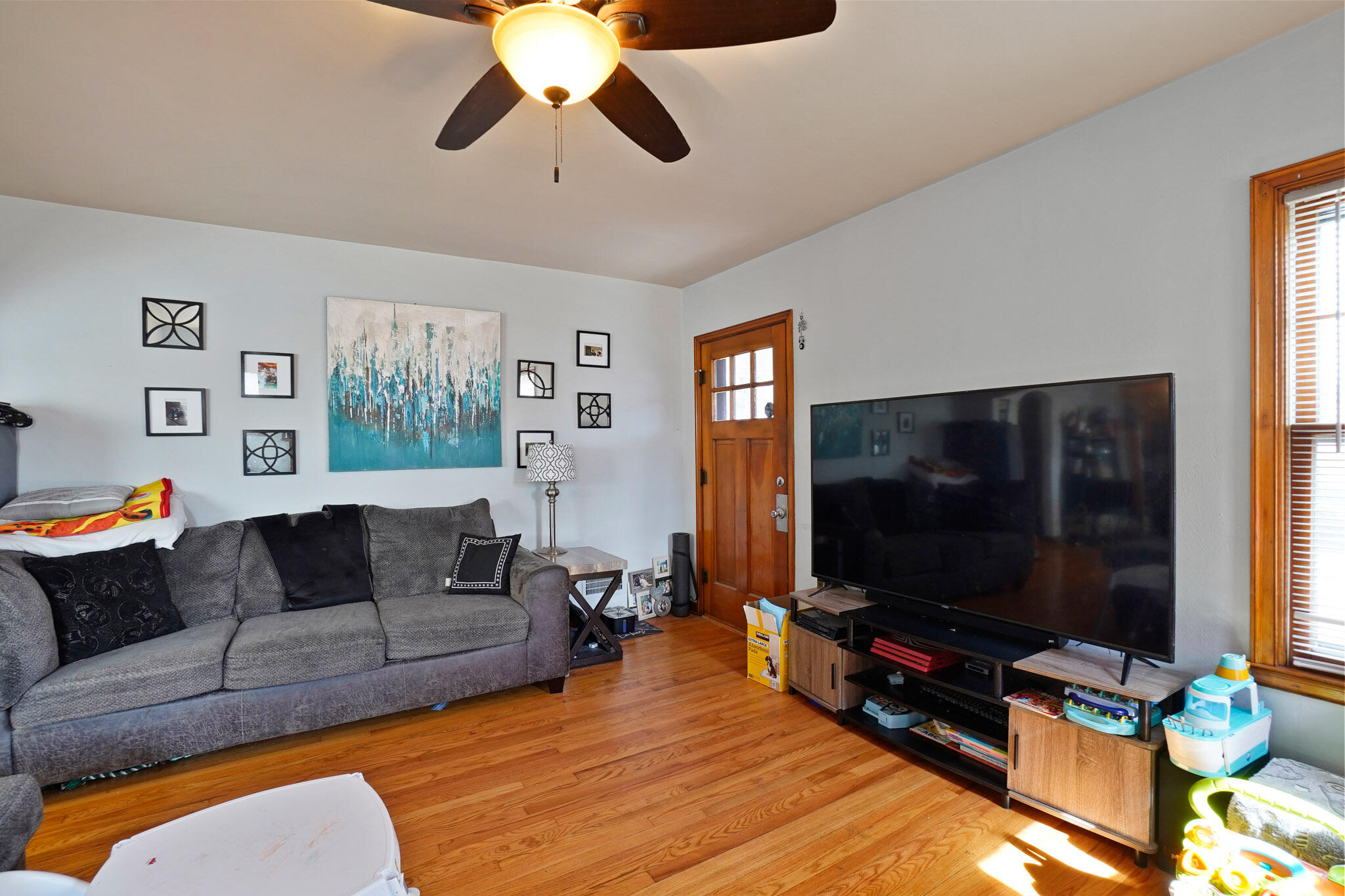 244 Dwiggins Griffith, IN 46319 - Photo 3 of 15 a living room with furniture and a flat screen tv