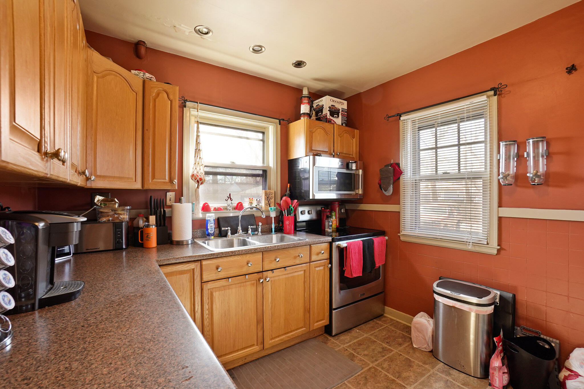 244 Dwiggins Griffith, IN 46319 - Photo 7 of 15 a kitchen filled a sink counter top space and stainless steel appliances