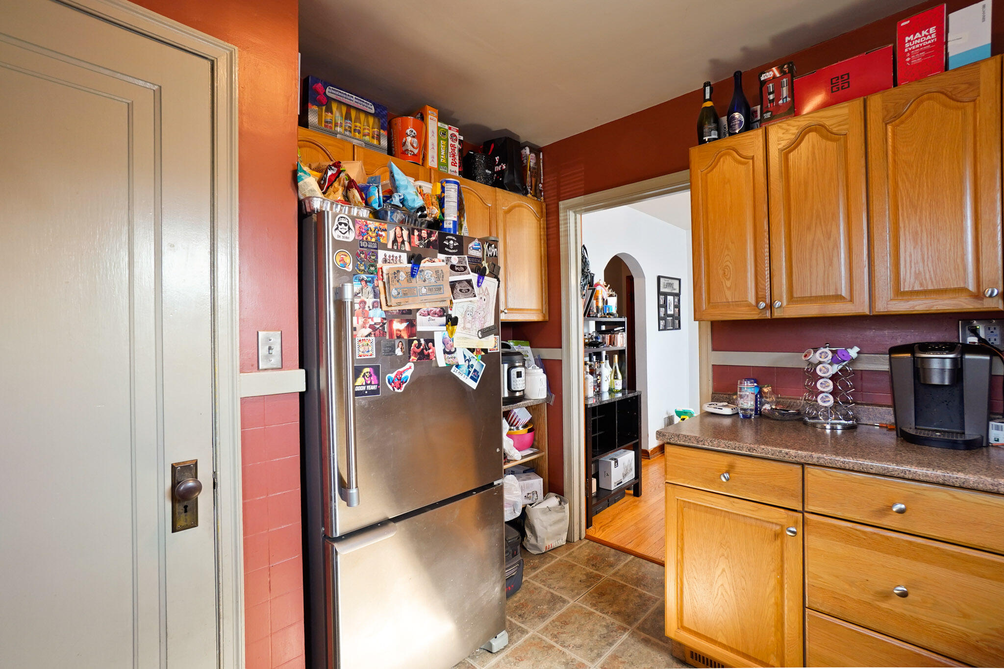 244 Dwiggins Griffith, IN 46319 - Photo 8 of 15 a kitchen with stainless steel appliances granite countertop a refrigerator and a sink