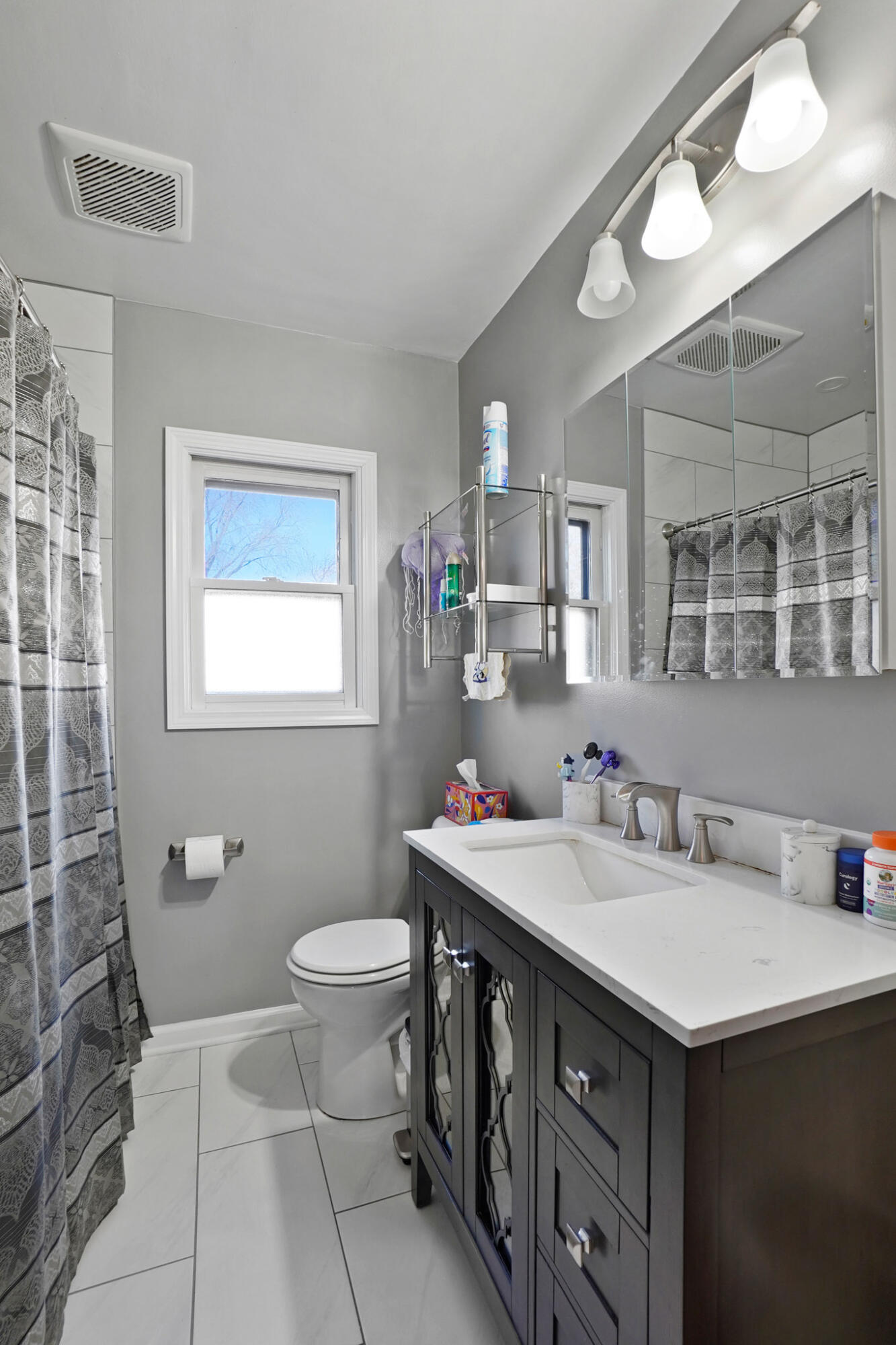 244 Dwiggins Griffith, IN 46319 - Photo 9 of 15 a bathroom with a sink vanity and a toilet