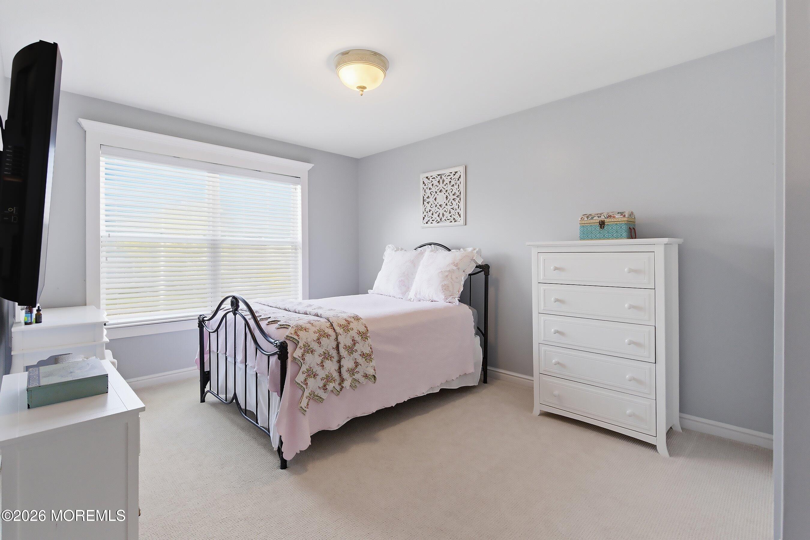23 Paulette Lane Howell, NJ 07731 - Photo 27 of 35 a room with a bed and a window