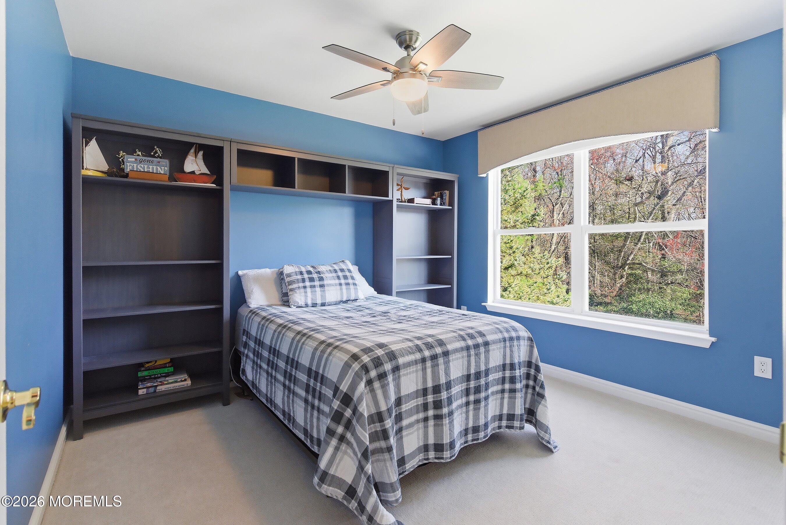 23 Paulette Lane Howell, NJ 07731 - Photo 28 of 35 a bedroom with a bed closet and window
