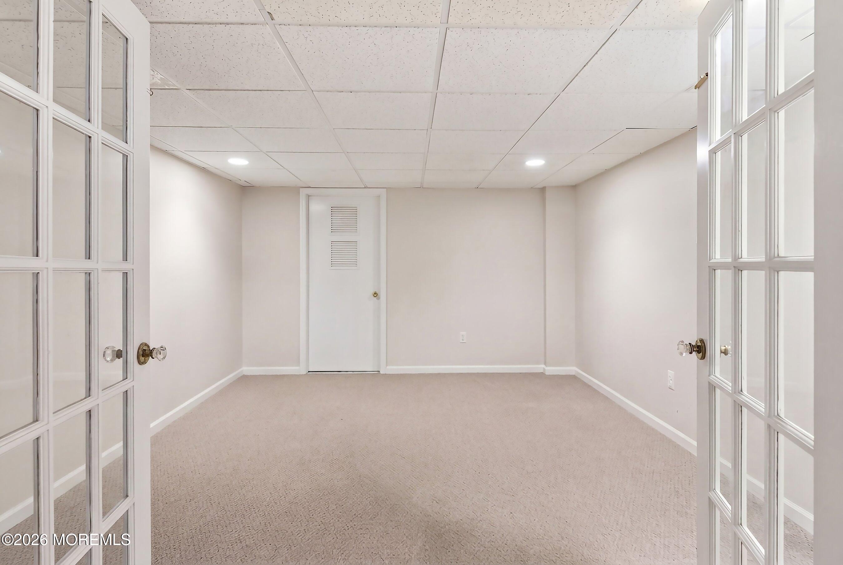 23 Paulette Lane Howell, NJ 07731 - Photo 34 of 35 a view of a hallway with a shower